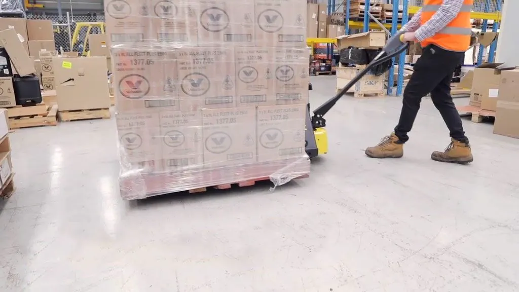Palletised imported cargo being loaded for delivery from a Brisbane port warehouse