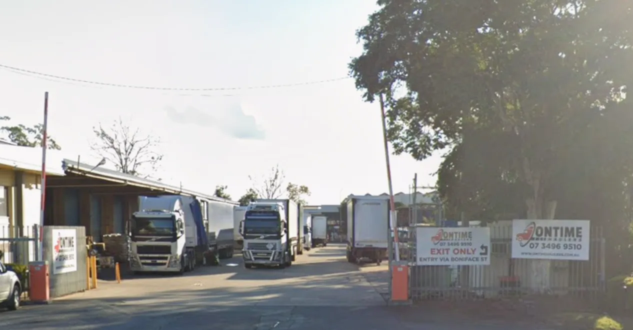 Ontime Haulers Archerfield depot front entrance with B-double accessible hardstand and branded signage