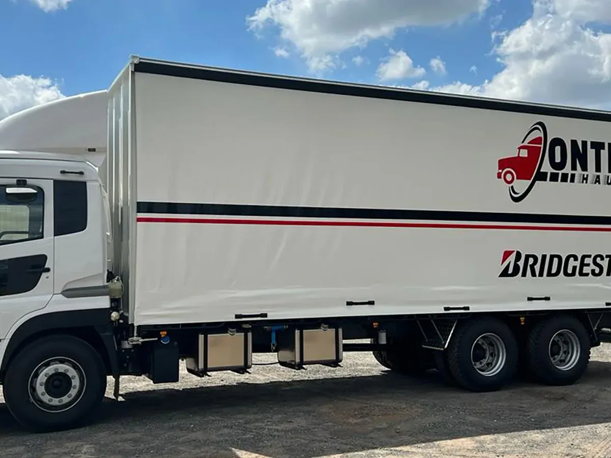 Ontime Haulers 12 tonne 14 pallet tautliner rigid truck with hydraulic tailgate